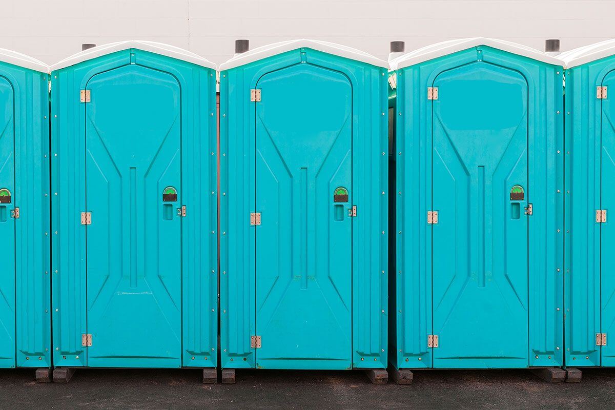 Industrial portable restroom units at a plant in Naperville, Illinois